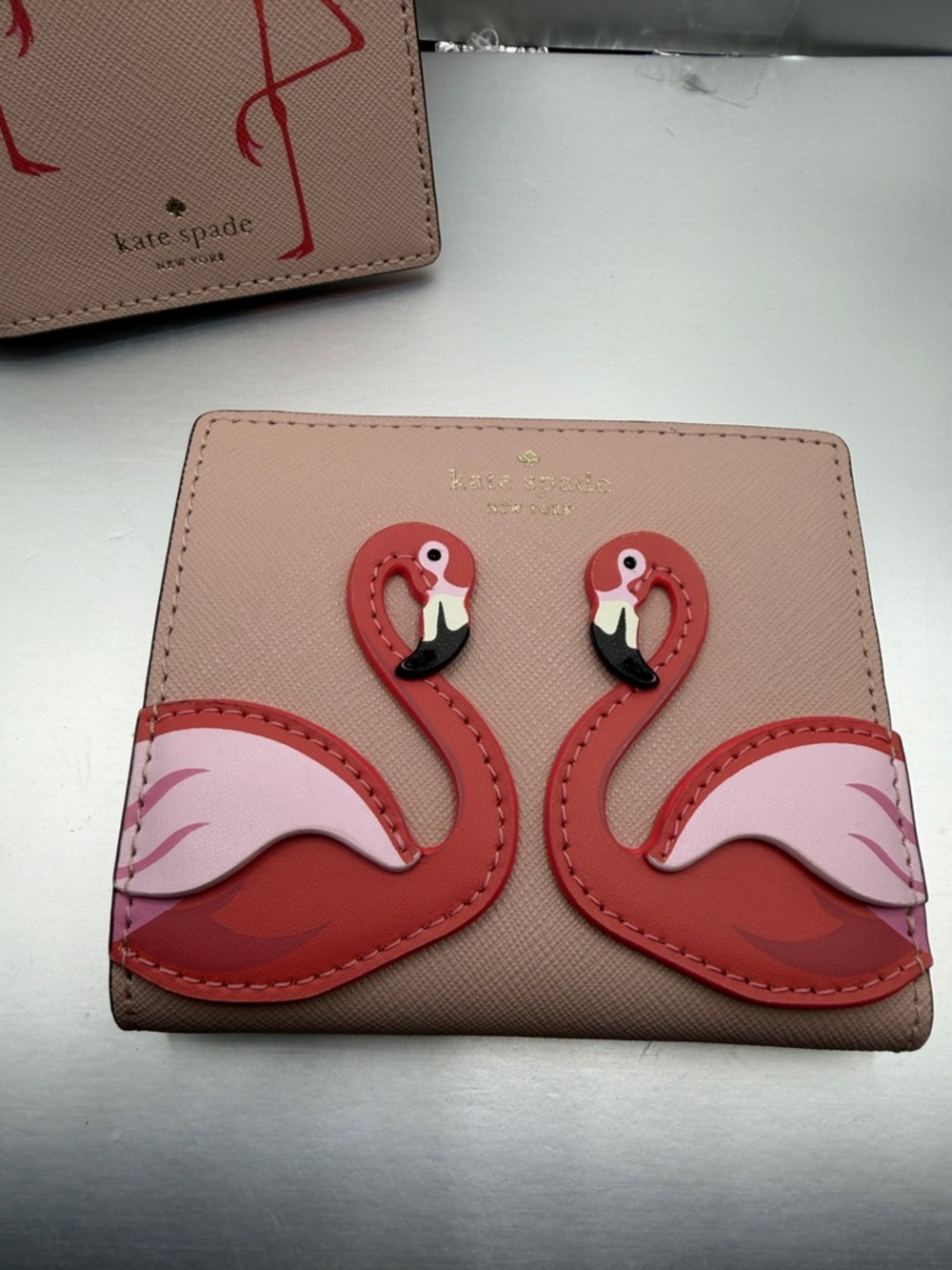 Kate Spade lot of two. Passport holder (new) and bifold wallet (like new) - Picture 2 of 11